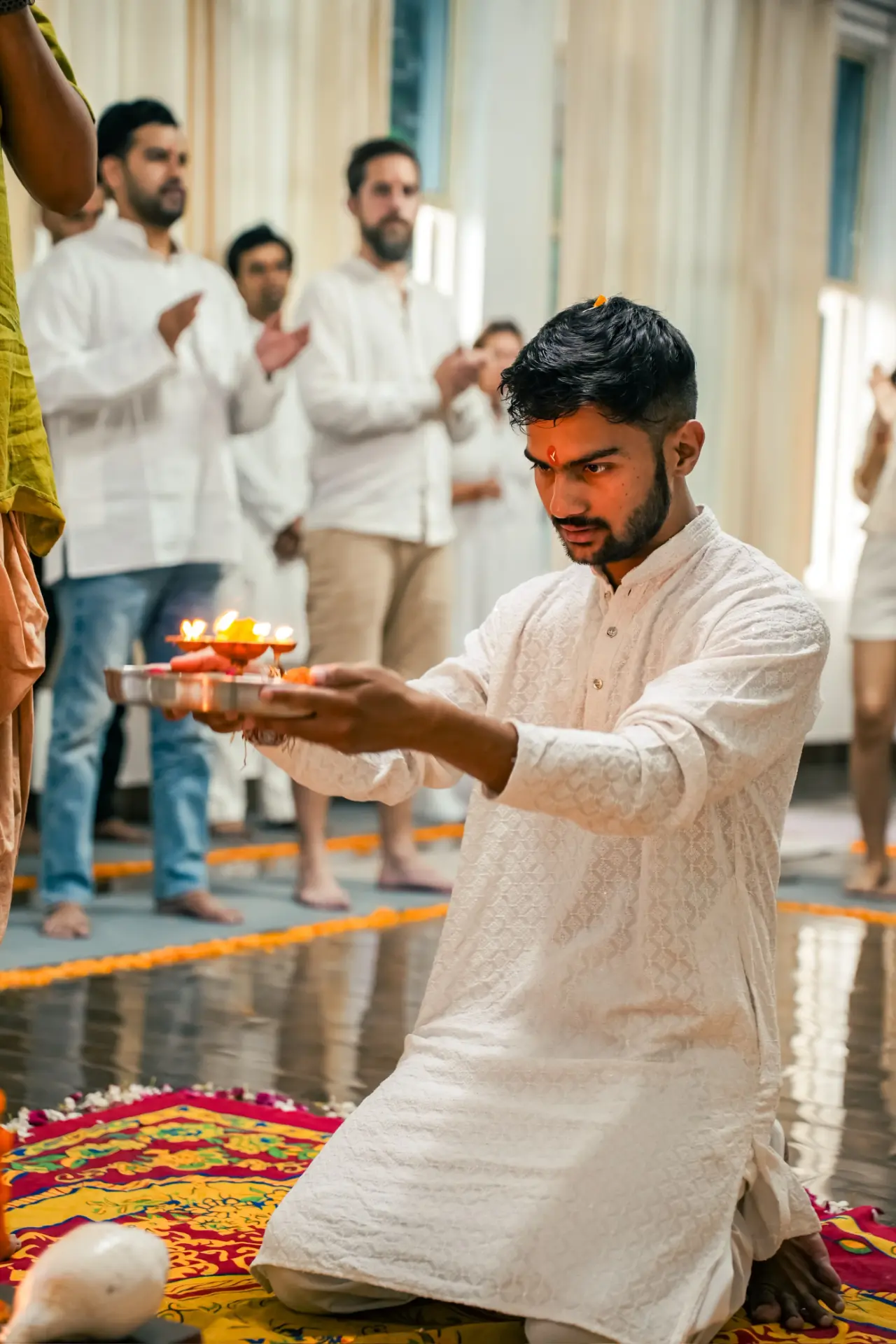 Aditya Panwar leading a ceremonial wellbeing experience